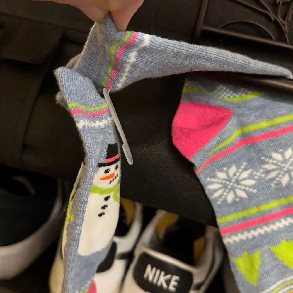 NWT pair of colorful Holiday/Winter socks.  Never been worn of course. Adult 7-9